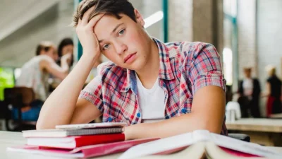 ahl exhausted man sitting desktop